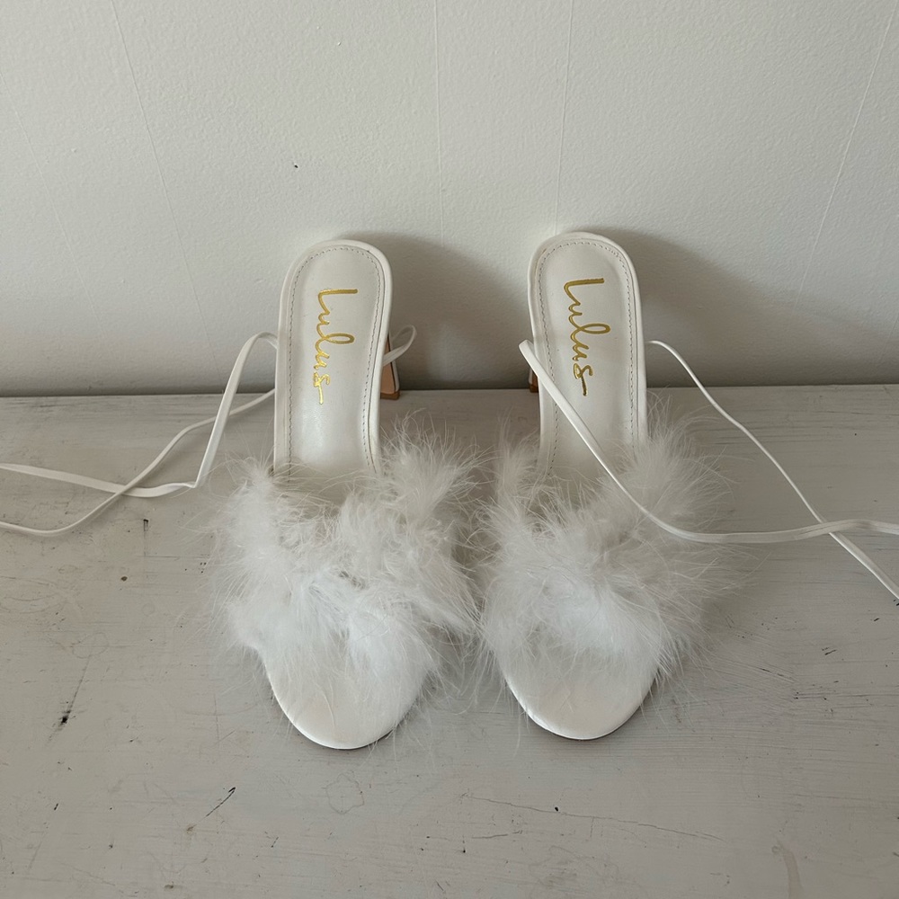 Lulus “Rebecca white feather lace up high heels”